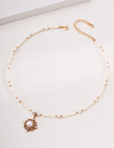 Vintage‑Gold Gothic Coronet Pearl Necklace