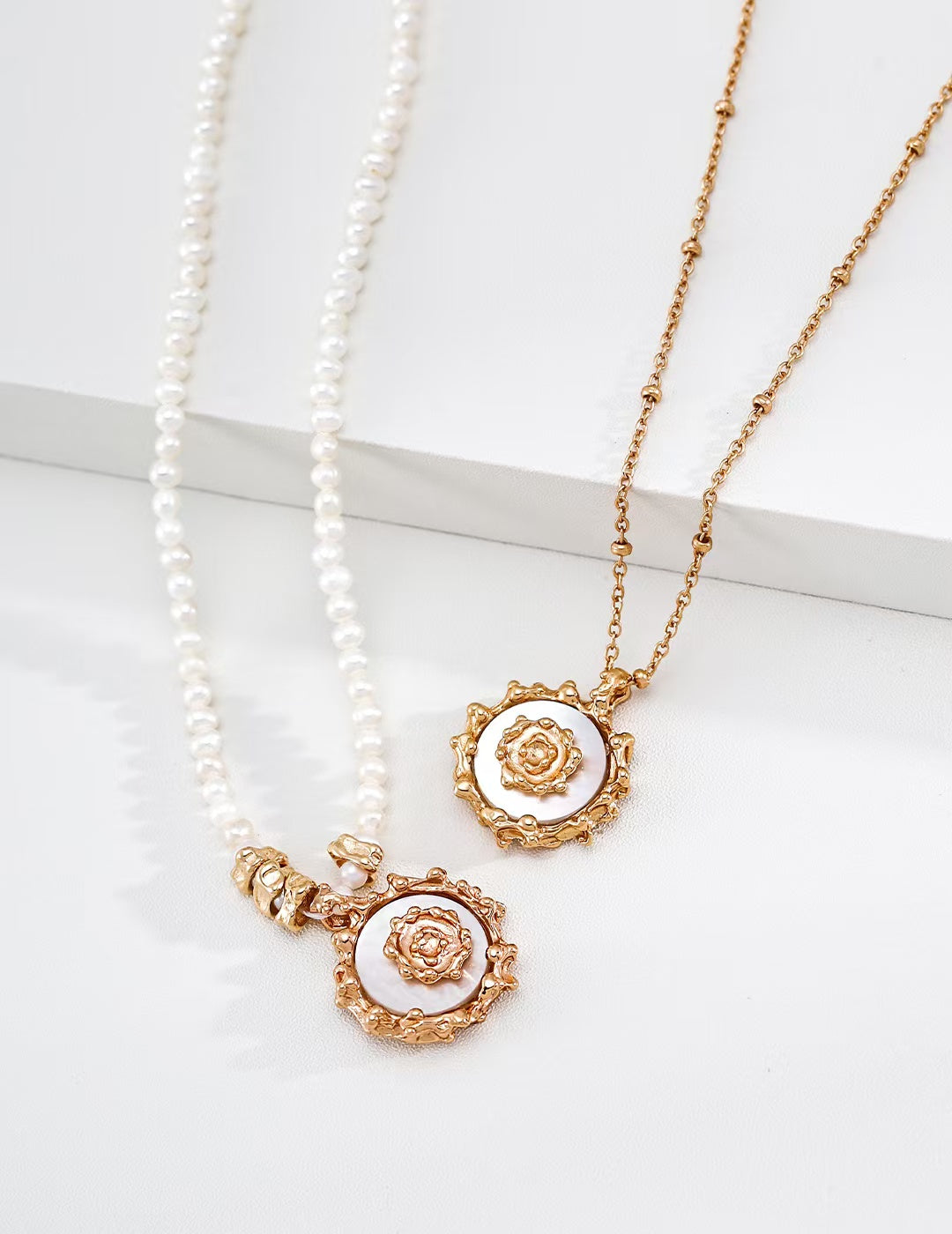 Mother-of-pearl necklace with sun-inspired design.