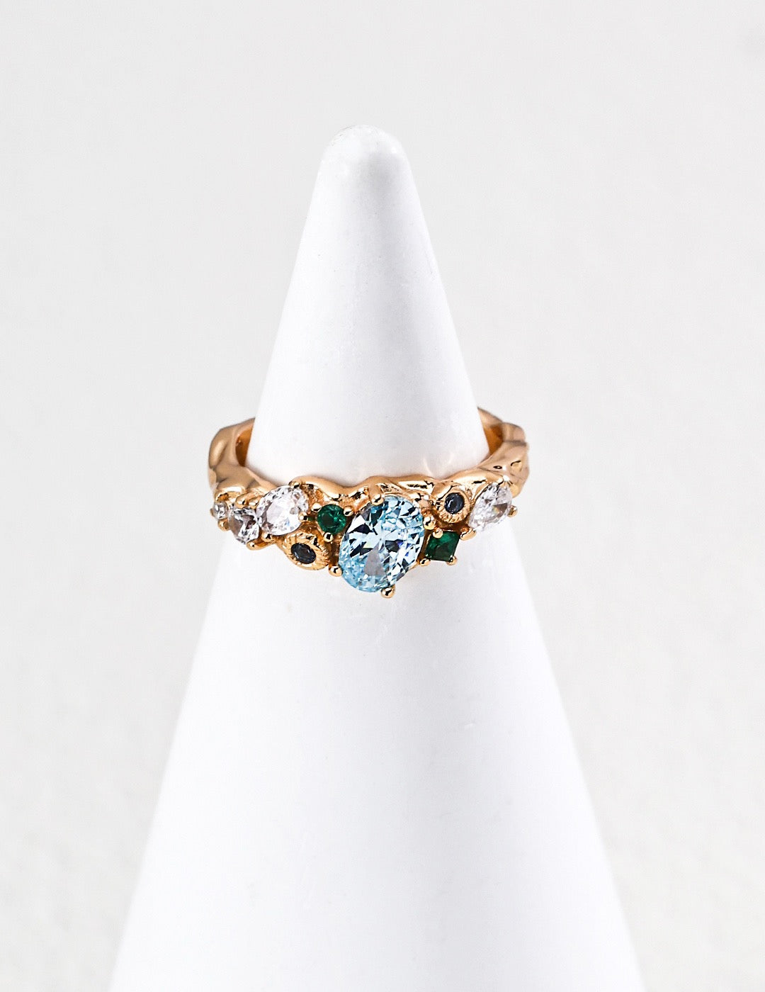 Forest Heartbeat Zircon Ring Silver structure shaped like twisting vines & budding flowers, capturing the vivid breath of the forest.