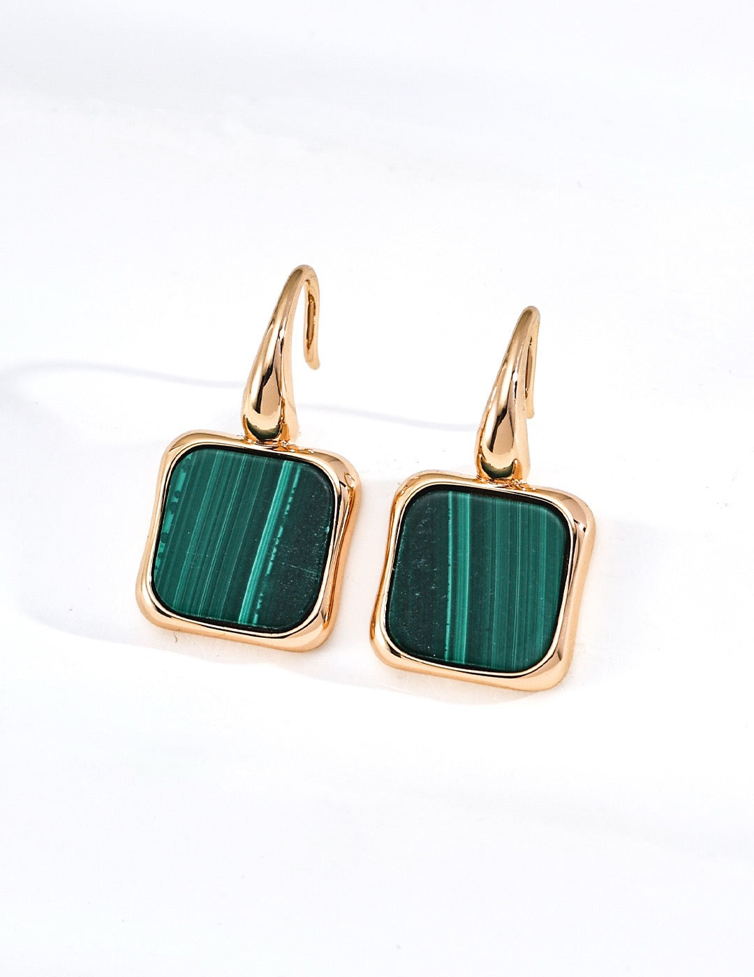 Malachite Earrings. Designed with minimalist setting for malachite. The intricate natural veins of malachite glow brilliantly within the sleek mounting