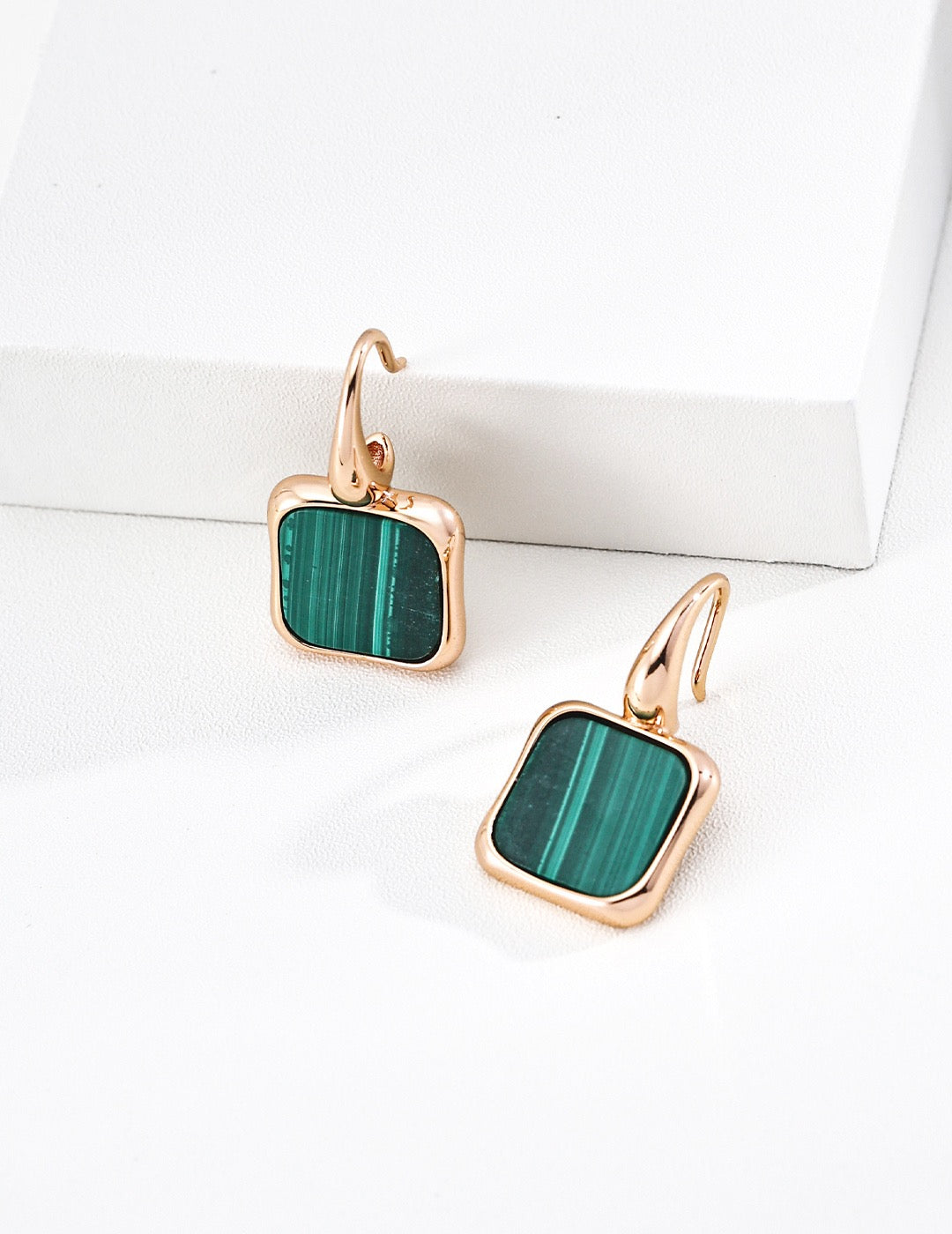 Malachite Earrings. Designed with minimalist setting for malachite. The intricate natural veins of malachite glow brilliantly within the sleek mounting